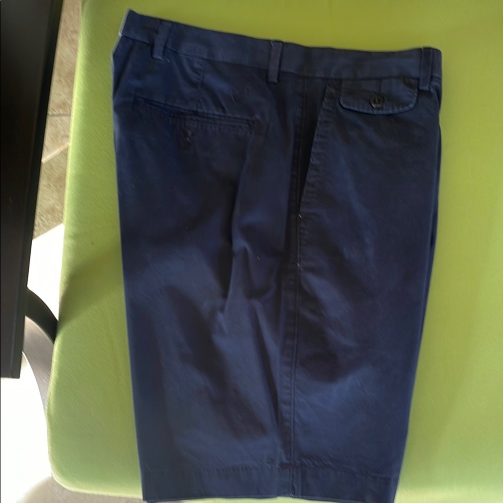 Blue Flat Front Shorts with Knee Length and Smooth Fabric